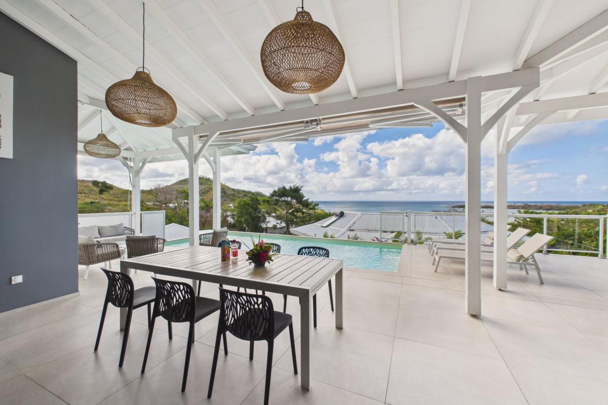 Location villa piscine 3 chambres diamant - salle à manger 1